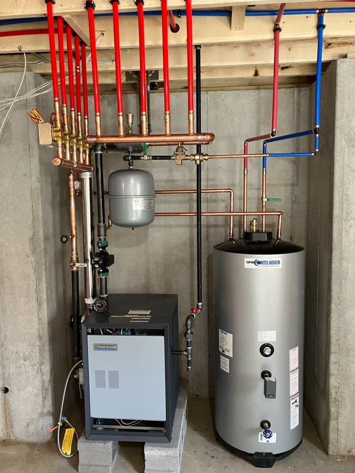 Installed residential boiler and water tank system